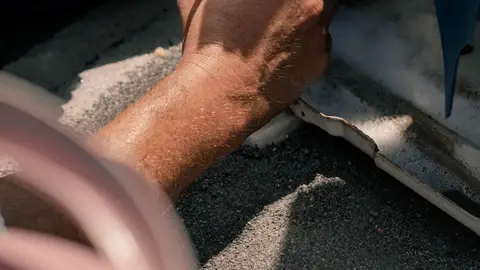 Man Repairing an Aircon