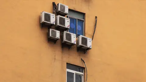 Apartment Windows with Multiple Air Conditioners