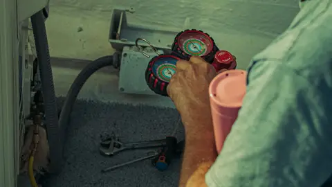 Man with Tools at Work