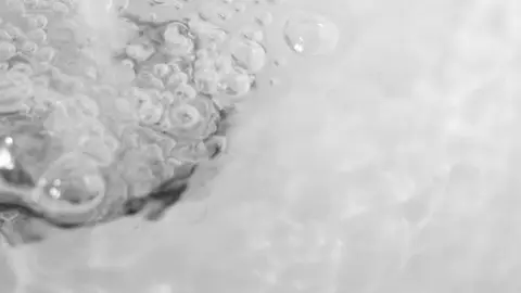Tap Water in a Sink