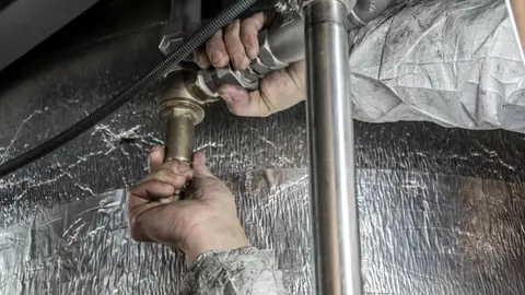Plumber Installs Pipe Fittings