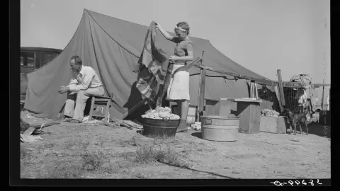 Roofer his daughter front tent