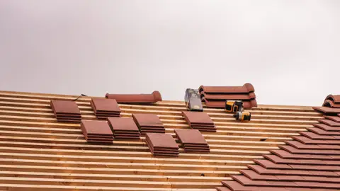 Roof Installation with Terracotta Tiles in Progress