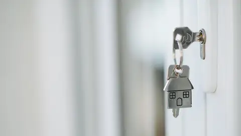 Close-up of the key with house keychain