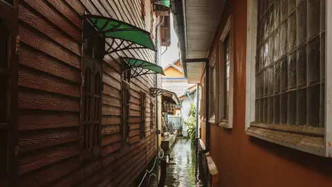 Narrow Alleyway Flooded in Surat Thani Town