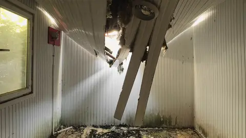 Damaged Room Interior with Collapsed Ceiling