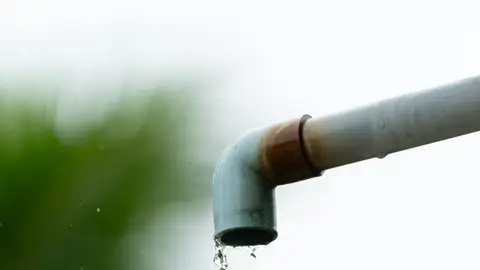 Water Dripping from an Outdoor Pipe