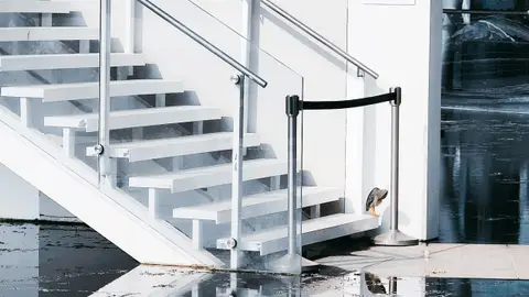 Flood Water on Concrete Floor and Staircase